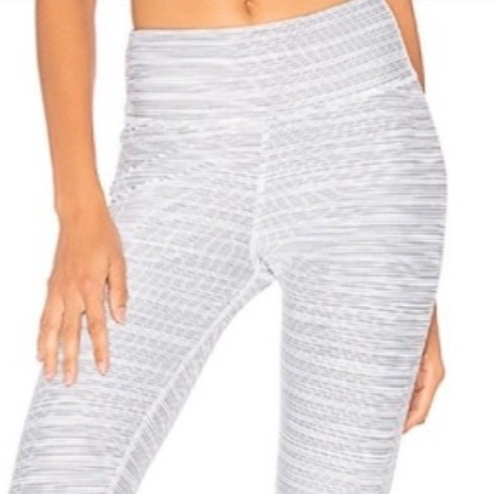 All Fenix Piper Black/White Stripe Leggings. Size Medium. Excellent Condition.